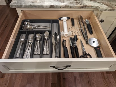 Image showing that the drawer boxes are as wide as the cabinet opening